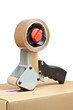 Packaging tape dispenser and shipping box Packaging tape dispenser and shipping box