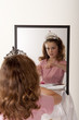 Photo: little girl playing make-up and fairy princess little girl playing make-up and fairy princess