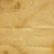 Burning and folded old paper background.