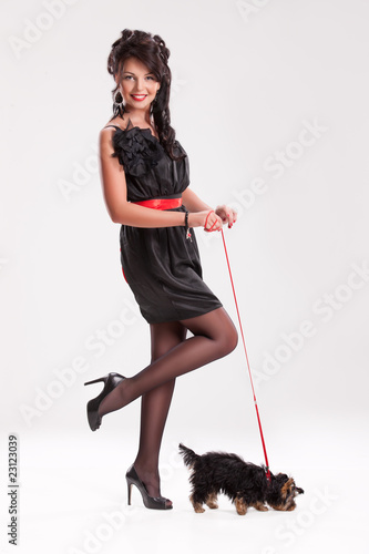 Photo: Young Woman With A Little Dog Young Woman With A Little Dog