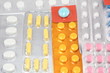 huge number of different pills such as aspirin, vitamins huge number of different pills such as aspirin, vitamins