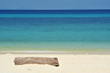 Timber on a white sandy beach. Timber on a white sandy beach.