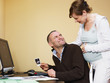 pregnant woman looking at scans