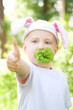 Child with bunny ears