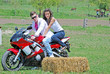Photo: couple on a motorbike couple on a motorbike