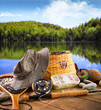 Photo: Fly fishing equipment near a lake Fly fishing equipment near a lake