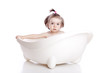 Girl in white bath tub