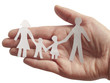 Photo: family in the female hand family in the female hand