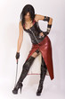 Beautiful sexy fetish model wearing latex holding the whip Beautiful sexy fetish model wearing latex holding the whip