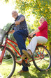 Photo: Riding tandem bicycle Riding tandem bicycle