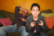 Hispanic Man and Boy Playing Video game