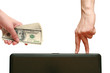 Man holds in his hand a hundred dollars and pays, fingers going Man holds in his hand a hundred dollars and pays, fingers going