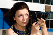 Female photographer takes a photo Female photographer takes a photo