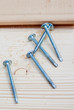 five screws on wood planks five screws on wood planks