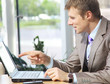 Businessman sitting and using laptop compute Businessman sitting and using laptop compute