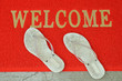 Red Welcome Mat And A Pair Of Lady Slippers Red Welcome Mat And A Pair Of Lady Slippers