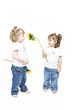 Adorable little twin girls isolated on white background