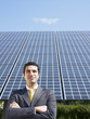 businessman and solar panels