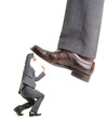 Foto: Businessman is kicking by a big foot Businessman is kicking by a big foot
