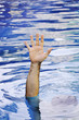 Hand of drowning man