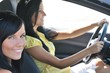 Two friends driving in car Two friends driving in car
