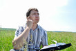A man sits and thinks about you read from the book
