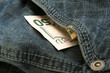 50 dollar bill in pocket of jean