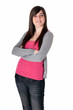 Young female cheerful with arms crossed isolated on white