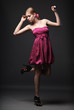 Beautiful young woman wearing pink dress and high heels Beautiful young woman wearing pink dress and high heels
