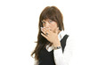 shocked young female covering mouth