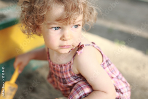 Photo: Child in sandpit Child in sandpit
