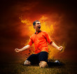 Football player in fires flame on the outdoors field