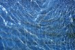 blue shallow water wavy reflection on beach blue shallow water wavy reflection on beach