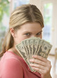 Woman Holding Cash