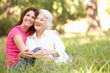 Senior Woman With Adult Daughter In Park