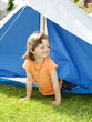 little girl 3 years old in a tent