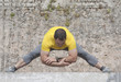 Man stretching to start running