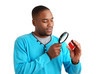 African american man with gift box and magnifying glass