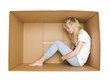 Photo: Woman in a cardboard box Woman in a cardboard box