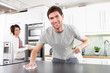 Photo: Young Couple Cleaning Cleaning Modern Kitchen Young Couple Cleaning Cleaning Modern Kitchen