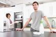 Photo: Young Couple Cleaning Cleaning Modern Kitchen Young Couple Cleaning Cleaning Modern Kitchen