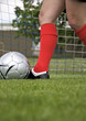 Photo: Beine beim Ball schießen Beine beim Ball schießen