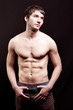 Shirtless young man with sexy abdomen