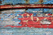 vieille peinture sur la coque d'un bateau de pêche