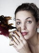 Beautiful girl with a carnival mask