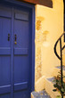 Mediterranean blue door with yellow wall