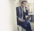 Handsome businessman talking over cellphone