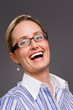 Laughing woman wearing glasses