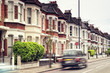 Photo: Terraced Houses and blured "Black Cab"in London. Terraced Houses and blured "Black Cab"in London.