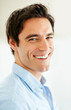 Closeup of a happy young man smiling